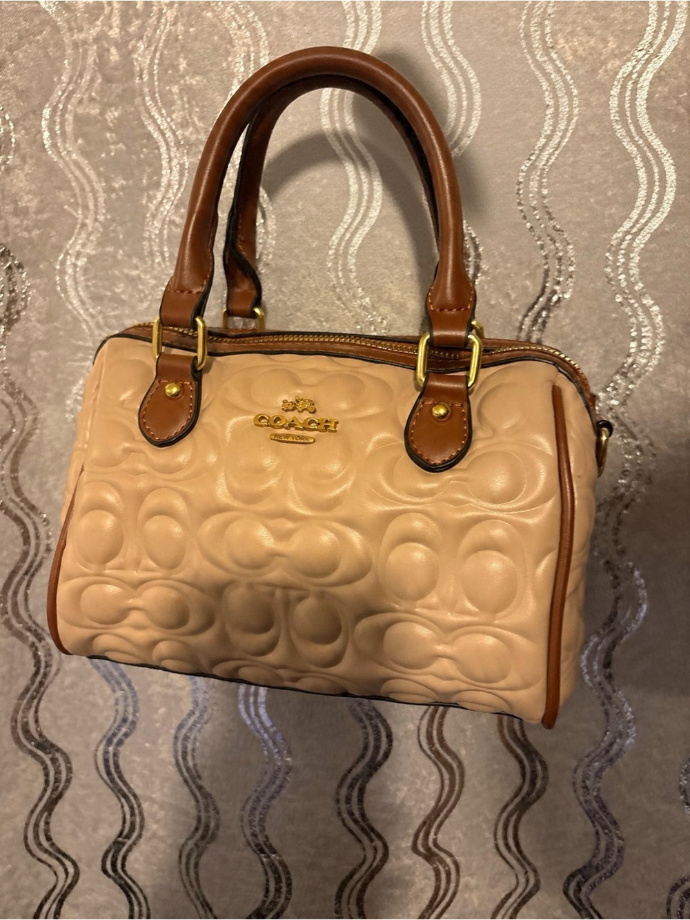 Beige Embossed Signature Satchel with Brown Trim